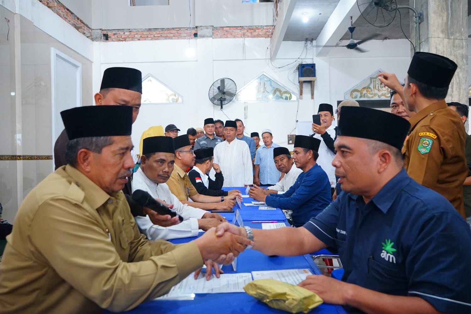 Gemar Siak Berzakat di Kec.Tualang,Bupati Alfedri harap Mustahik bisa Menjadi Muzakki